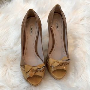 Miu Miu bow front platform pumps